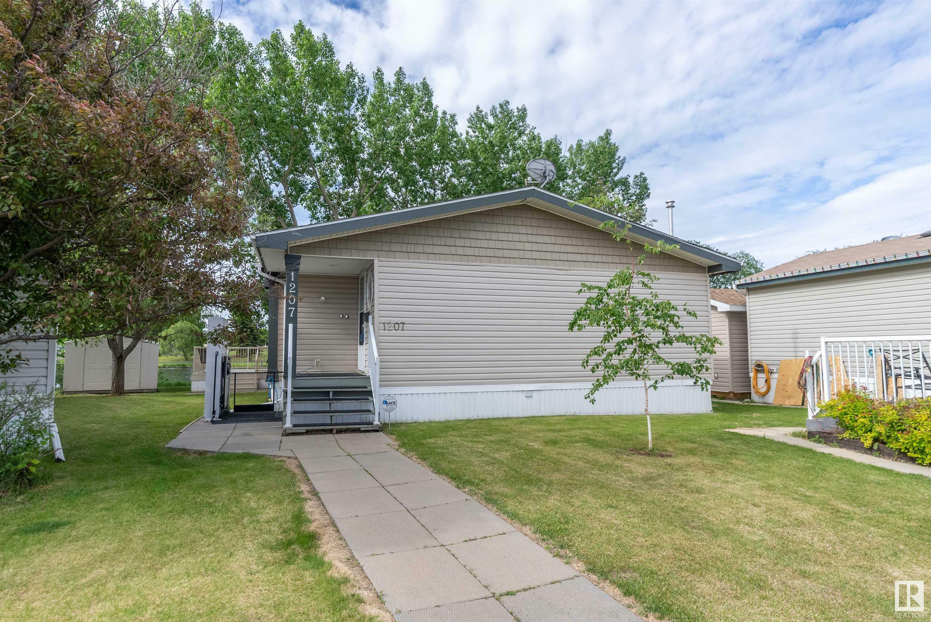 Property Photo: 53222 Rge Rd 272 1207 AB T7X 4K4