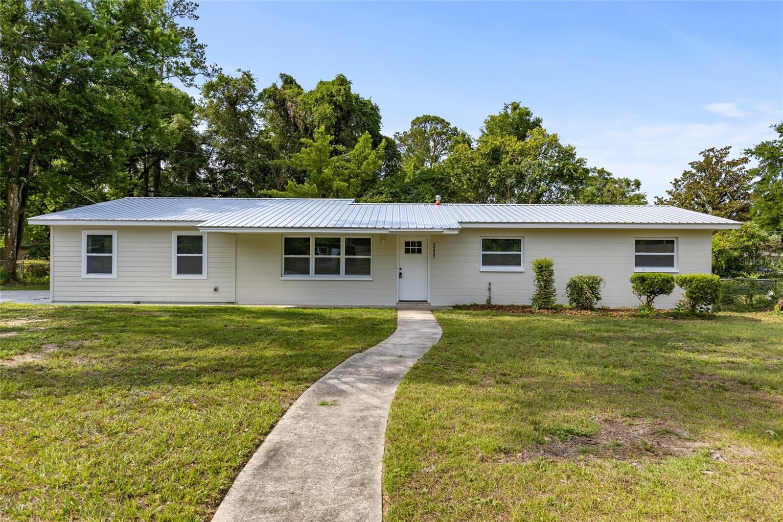 Property Photo:  3237 NW 30th Avenue  FL 32605 