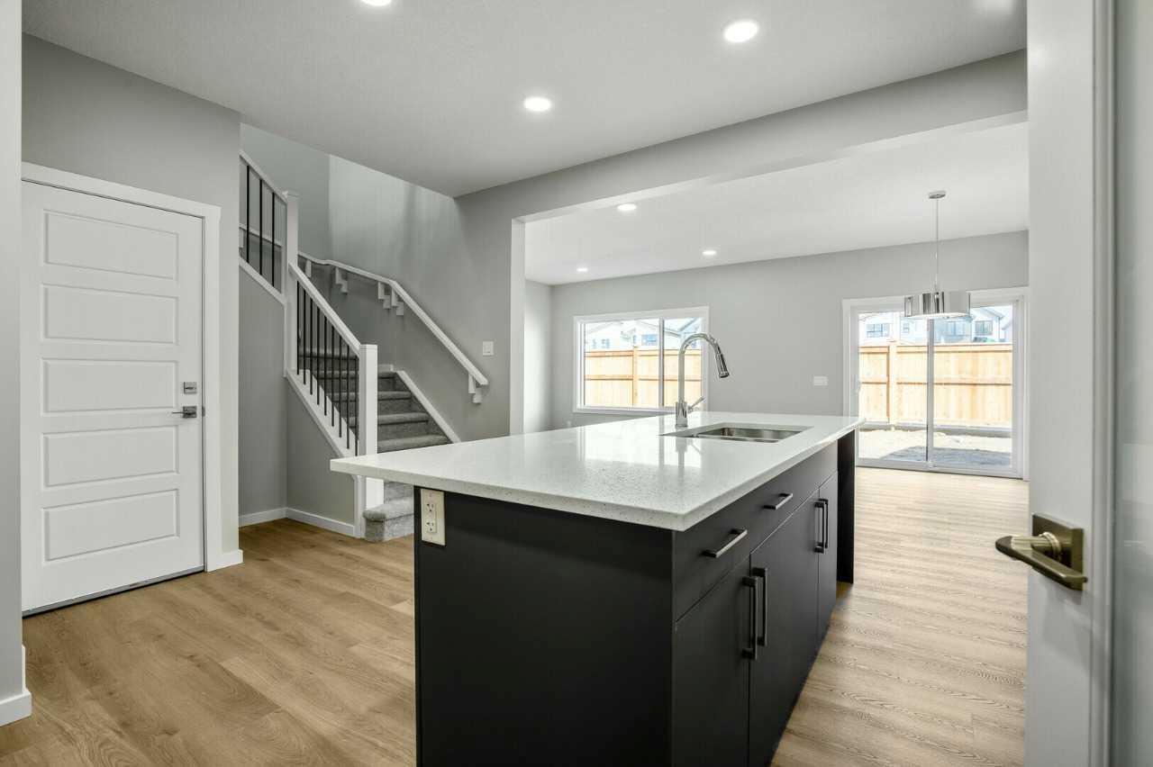 Property Photo: 11 Heritage Link AB T4C 2J8