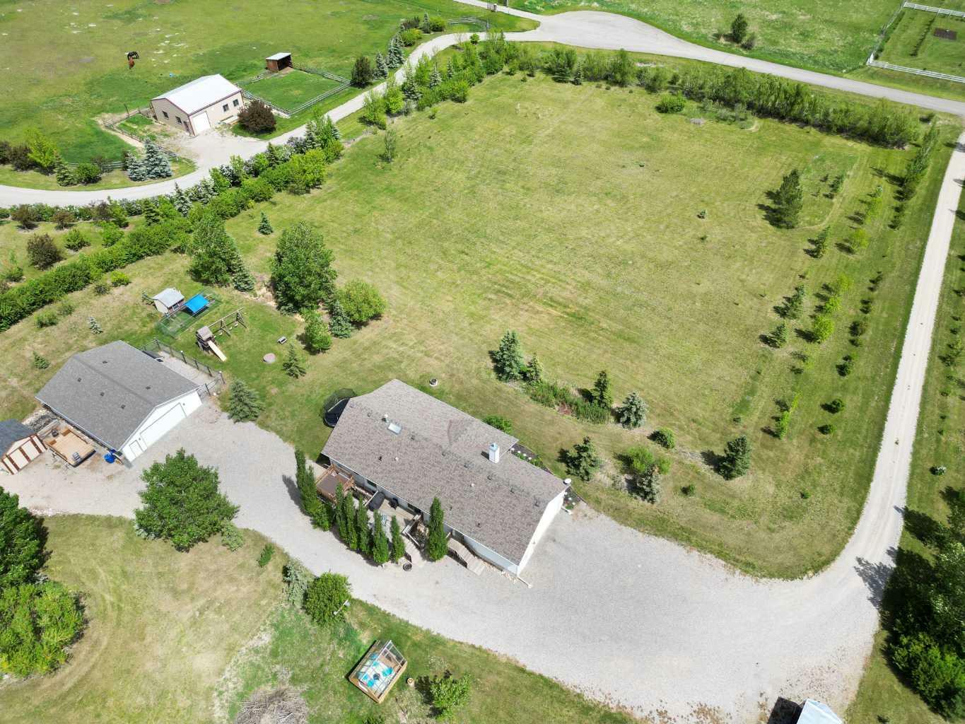 Property Photo: 387217 2 Street W AB T1S 1A1