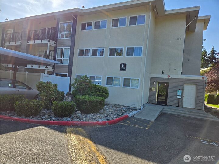 Property Photo:  12700 NE 8th Street E308  WA 98005 