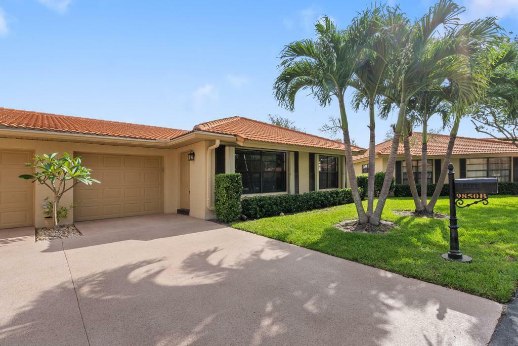 Property Photo: 9850 Bischofia Tree Way B FL 33436