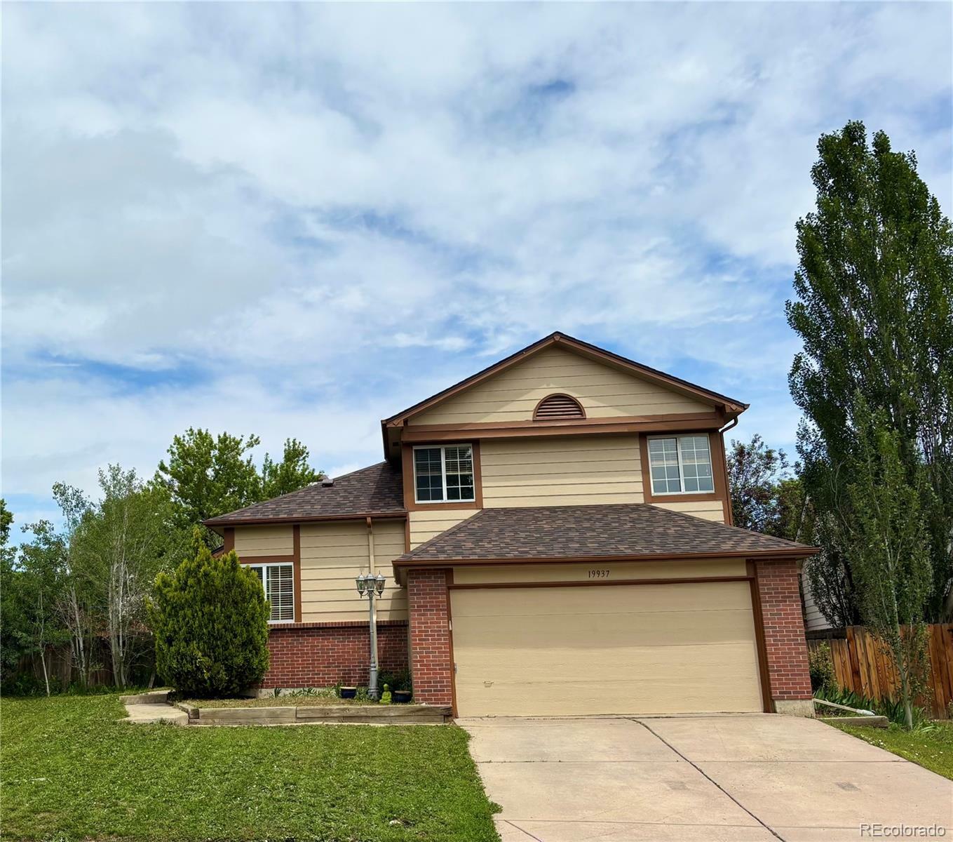Property Photo: 19937 E Loyola Place CO 80013