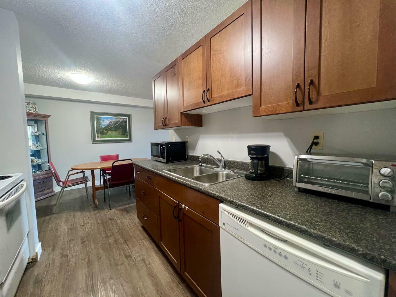 Property Photo: 19 Bennett Street 104 AB T4R 1V3