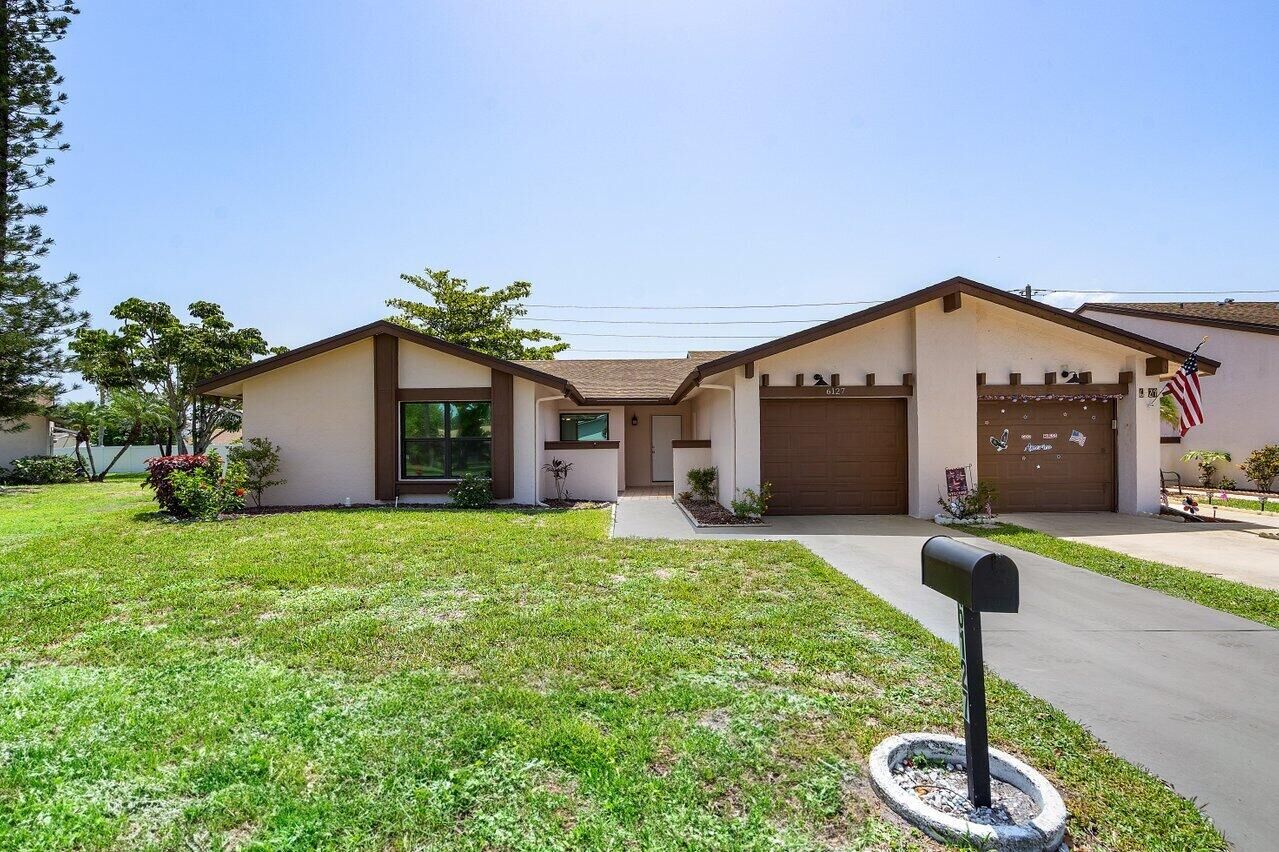 Property Photo:  6127 Elsinore Circle  FL 33463