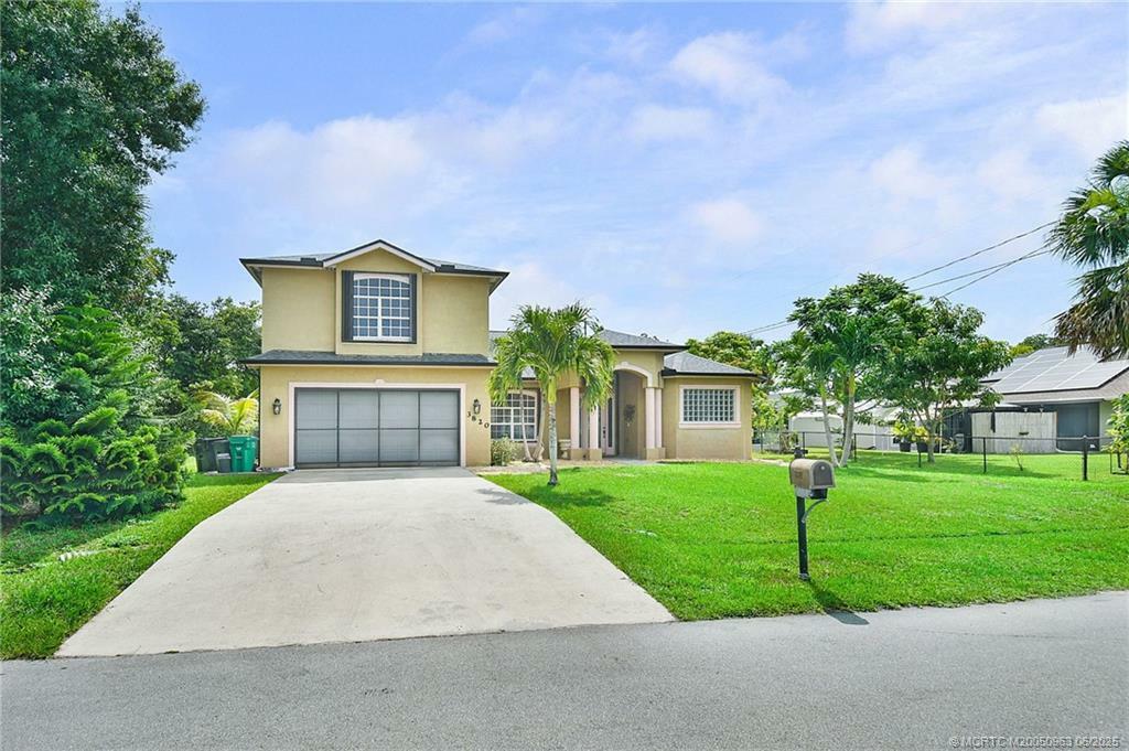 Property Photo: 3820 SW Cheribon Street FL 34953