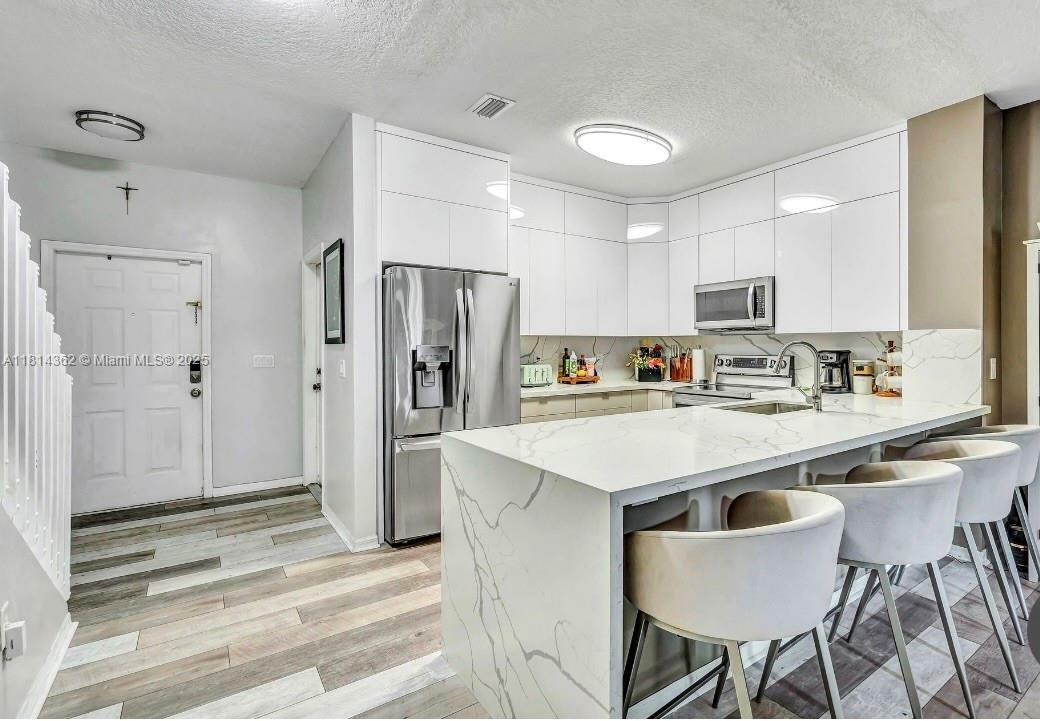 Property Photo: 1114 NW 100th Ave FL 33024