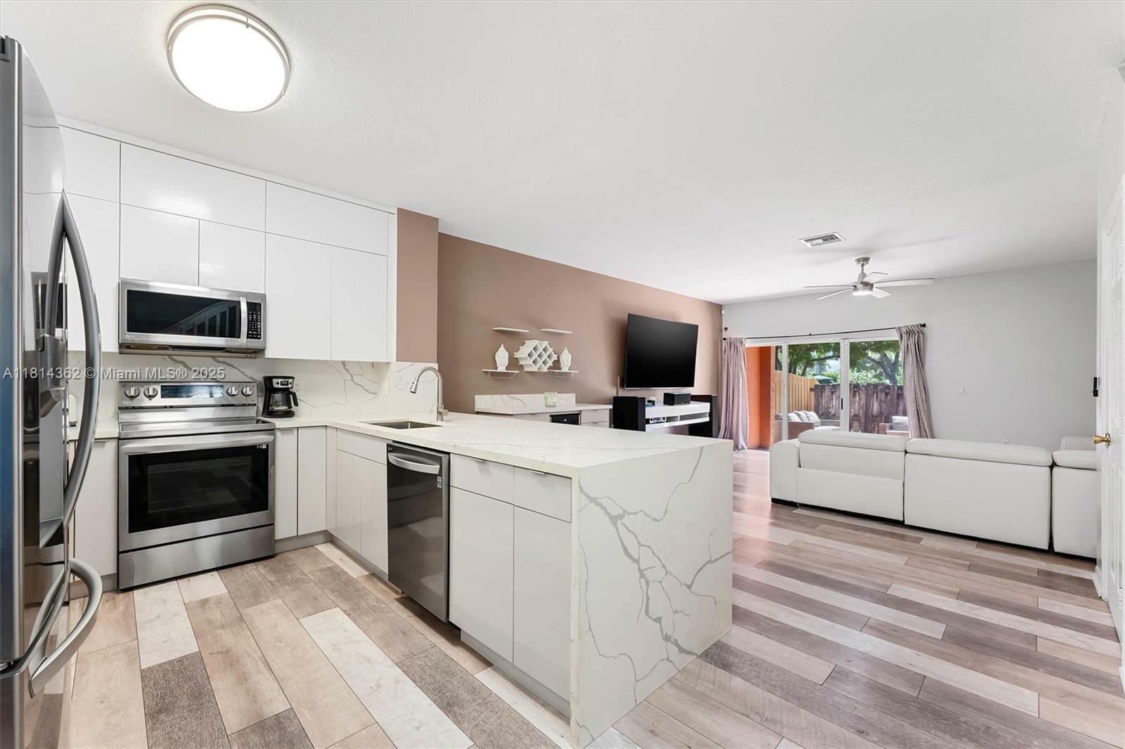 Property Photo: 1114 NW 100th Ave FL 33024