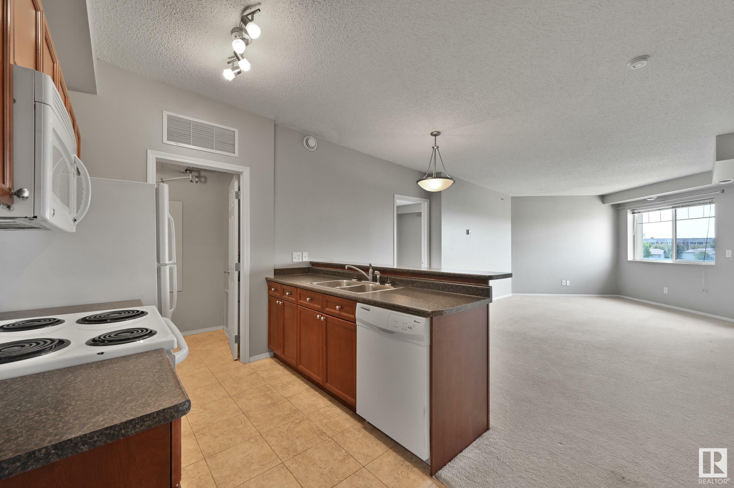 Photo de la propriété:  6921 199 Street NW 409  AB T6M 2N8 