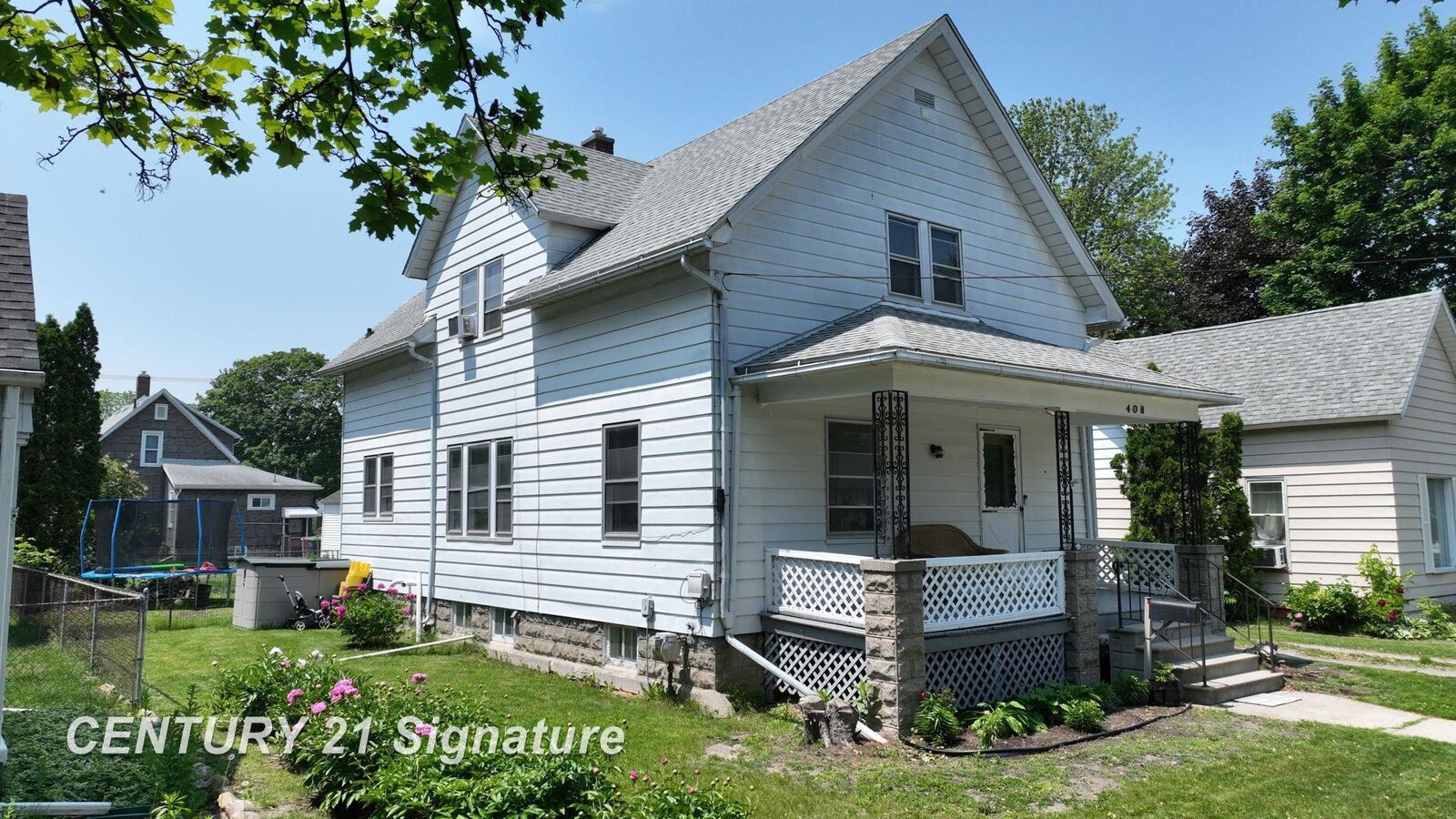 Property Photo:  408 S Alp Street  MI 48706 