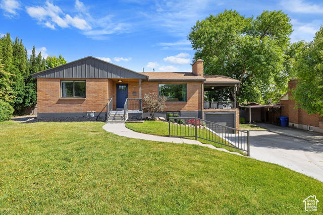 Property Photo: 1876 E Northwoodside Dr S UT 84124