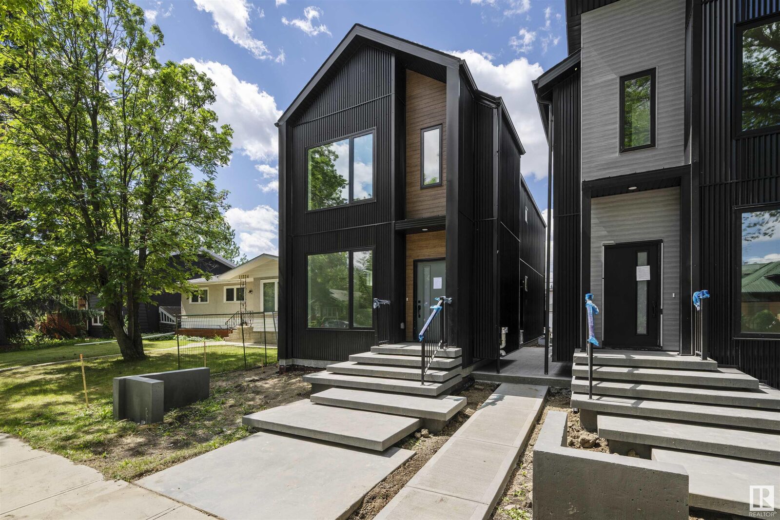 Property Photo:  11230 127 Street NW  AB T5M 0T6 