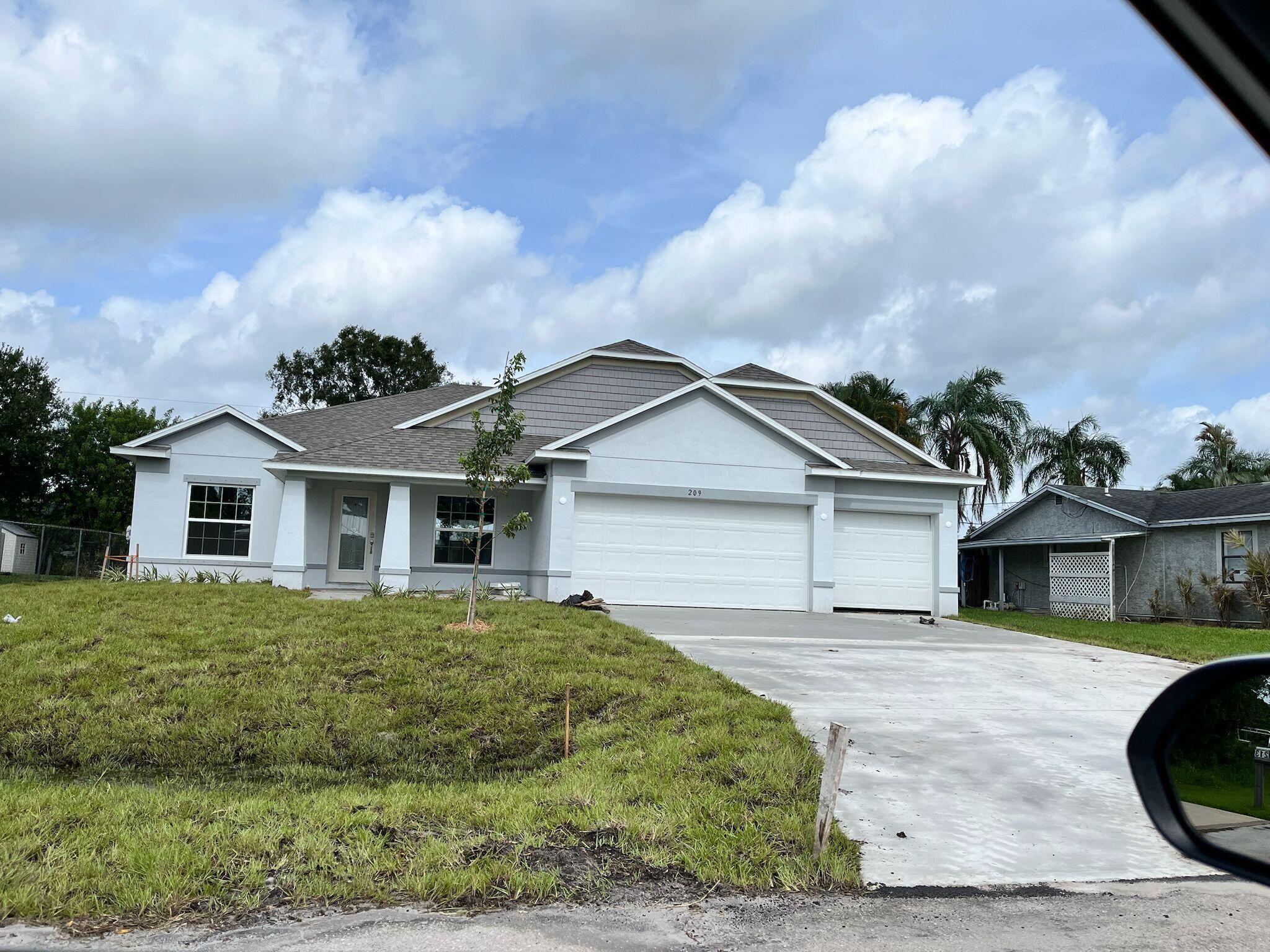Property Photo: 209 SW Christmas Terrace FL 34984