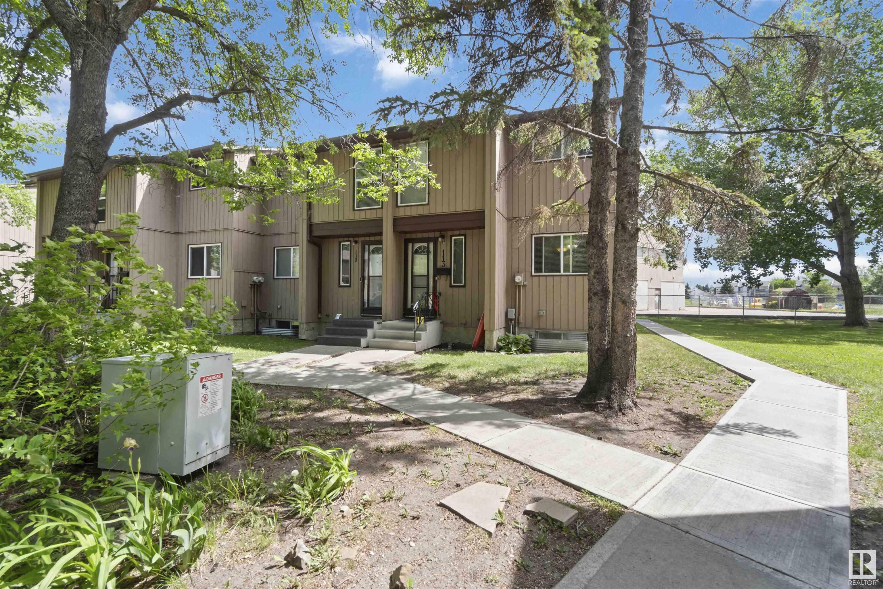Property Photo: 10633 31 Avenue NW 113 AB T6J 4N4