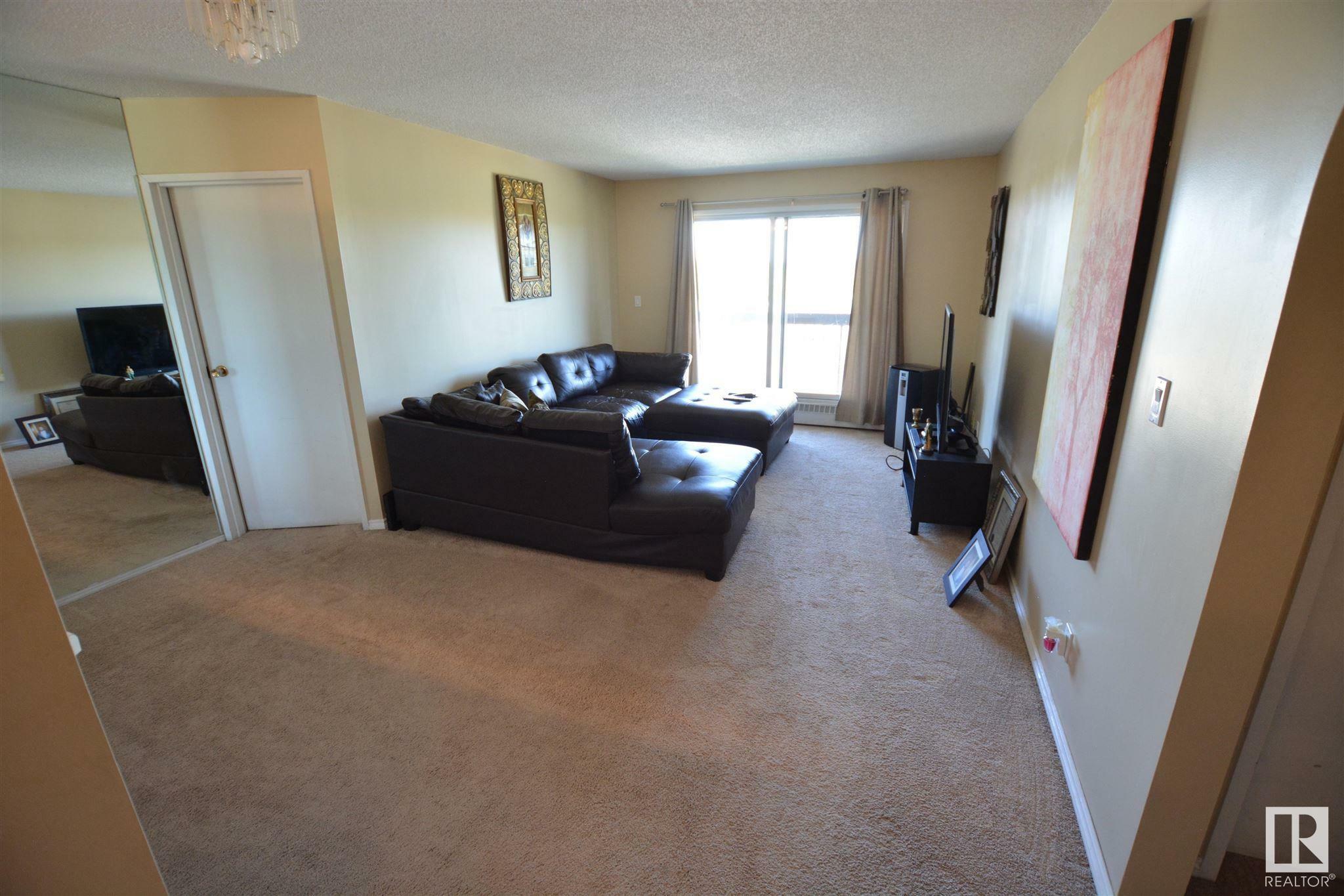 Property Photo: 10511 19 Avenue NW 403 AB T6J 5S8
