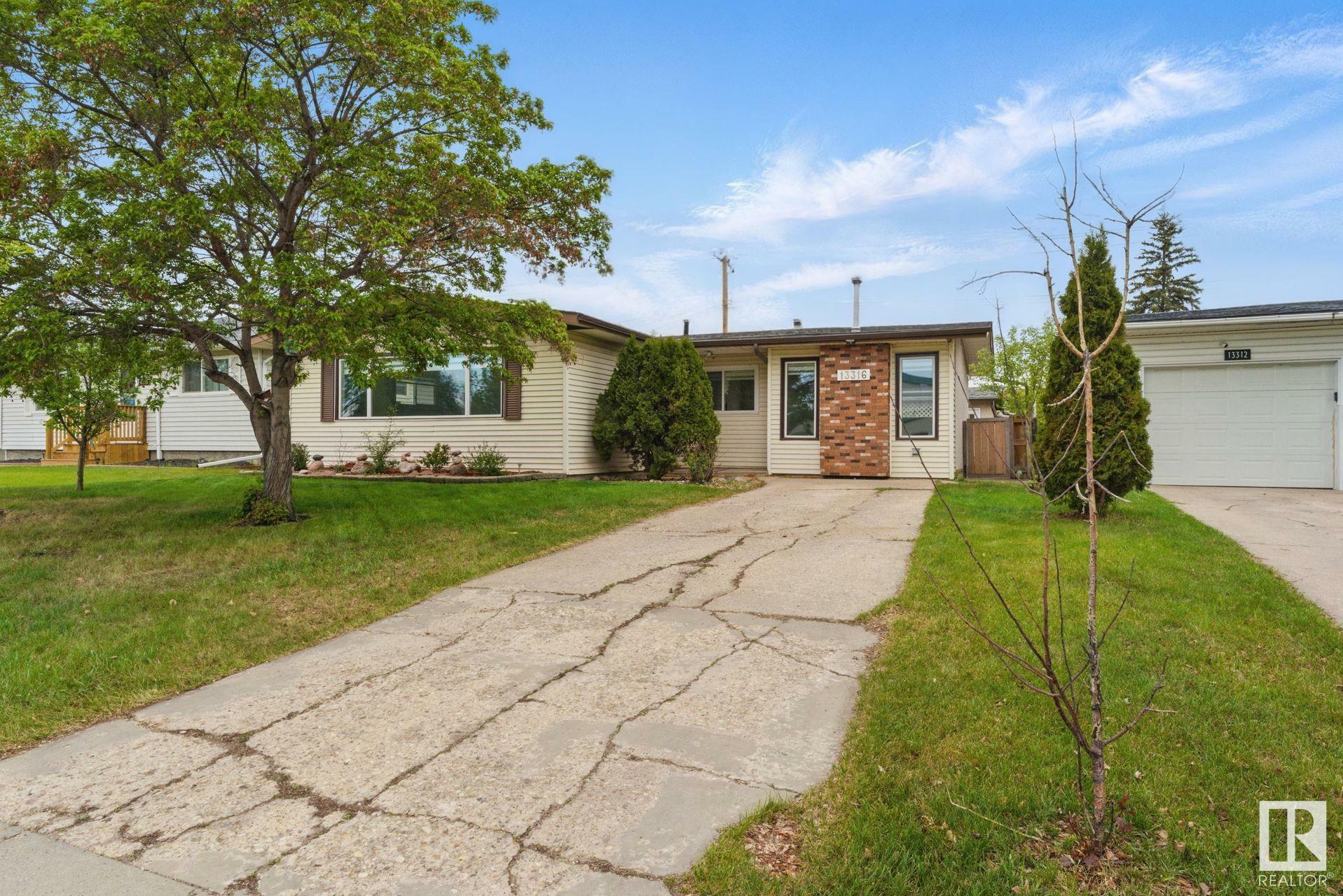Property Photo: 13316 136 Avenue NW AB T5L 4B3