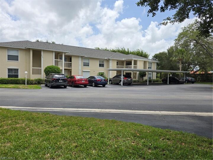 Property Photo: 605 Squire Cir 203 FL 34104