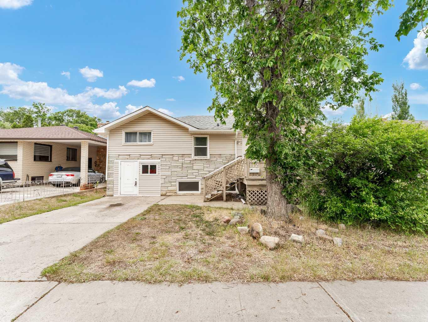 Property Photo:  112 8 Street SW  AB T1A 4L6 