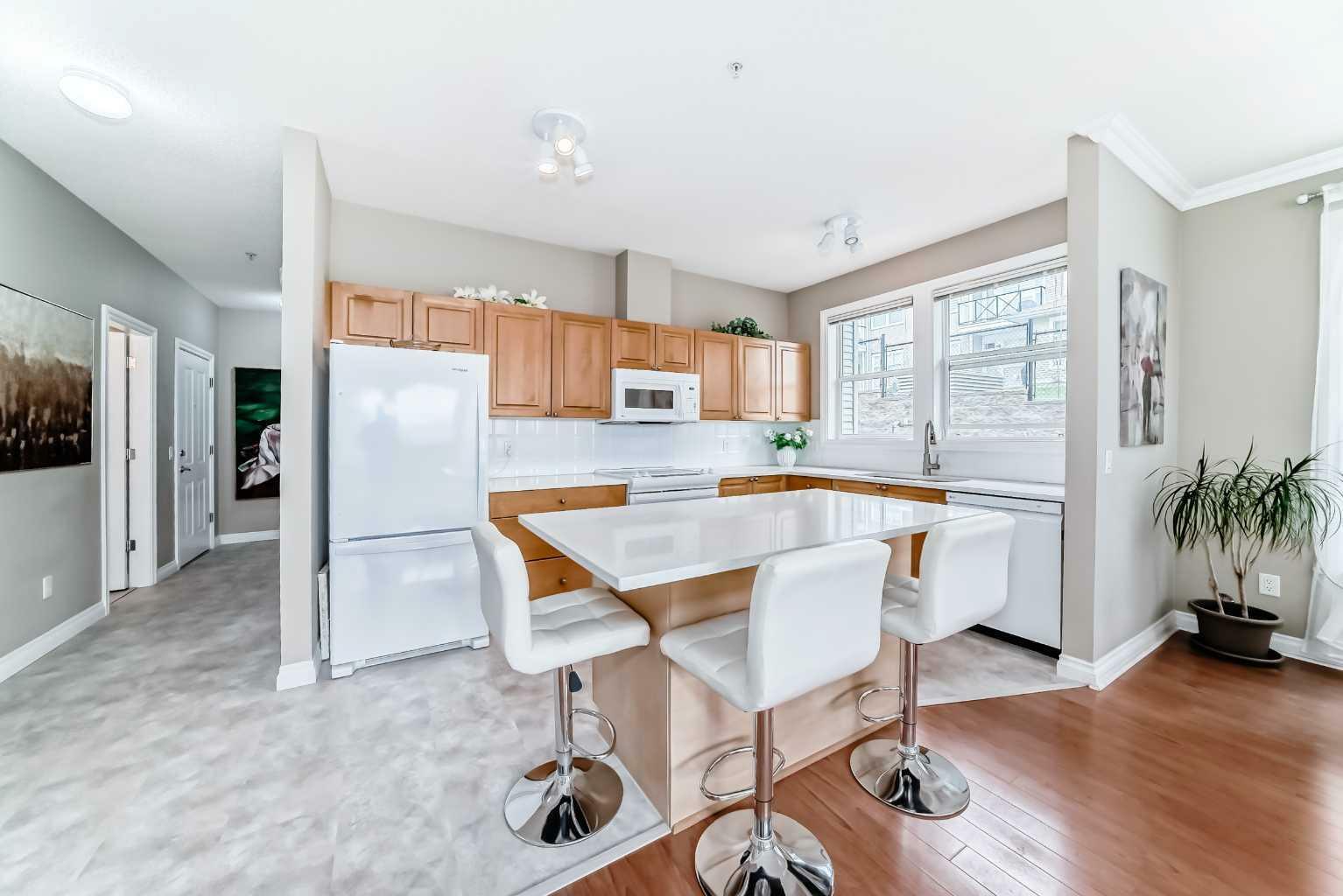 Property Photo: 1010 Arbour Lake Road NW 2120 AB T3G 4Y8