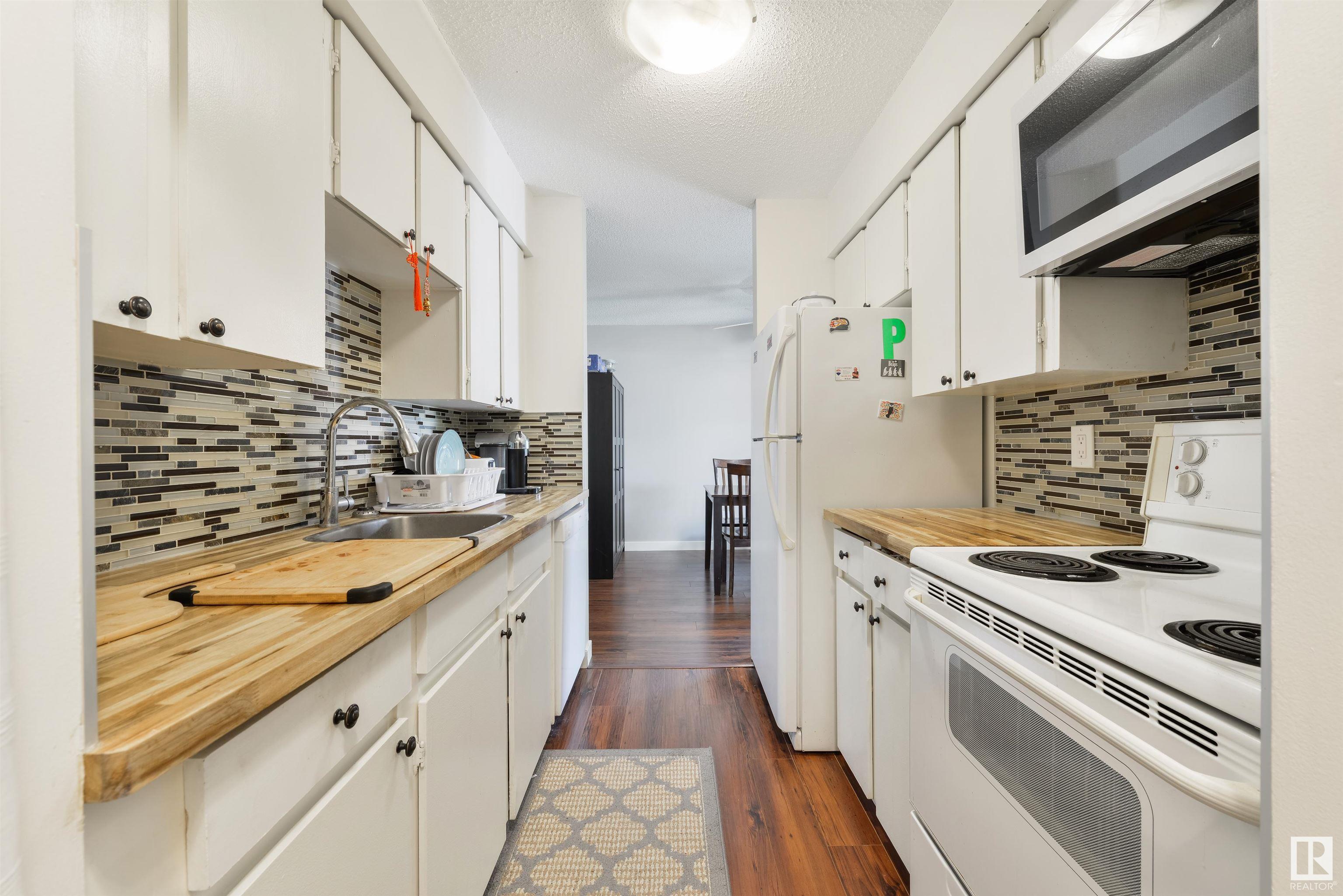 Property Photo: 14707 53 Avenue NW 109 AB T6H 5C9