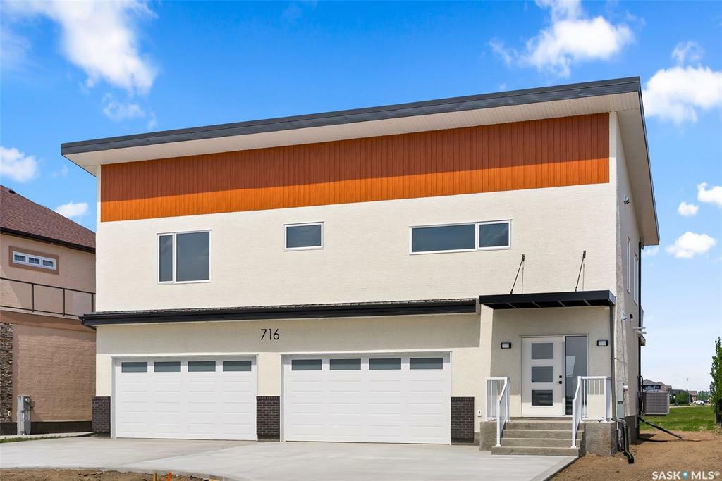 Property Photo: 716 Emerald Park Road SK S4L 0C4