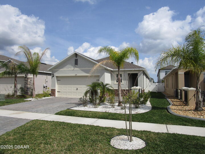 Property Photo:  349 Caryota Court  FL 32168 