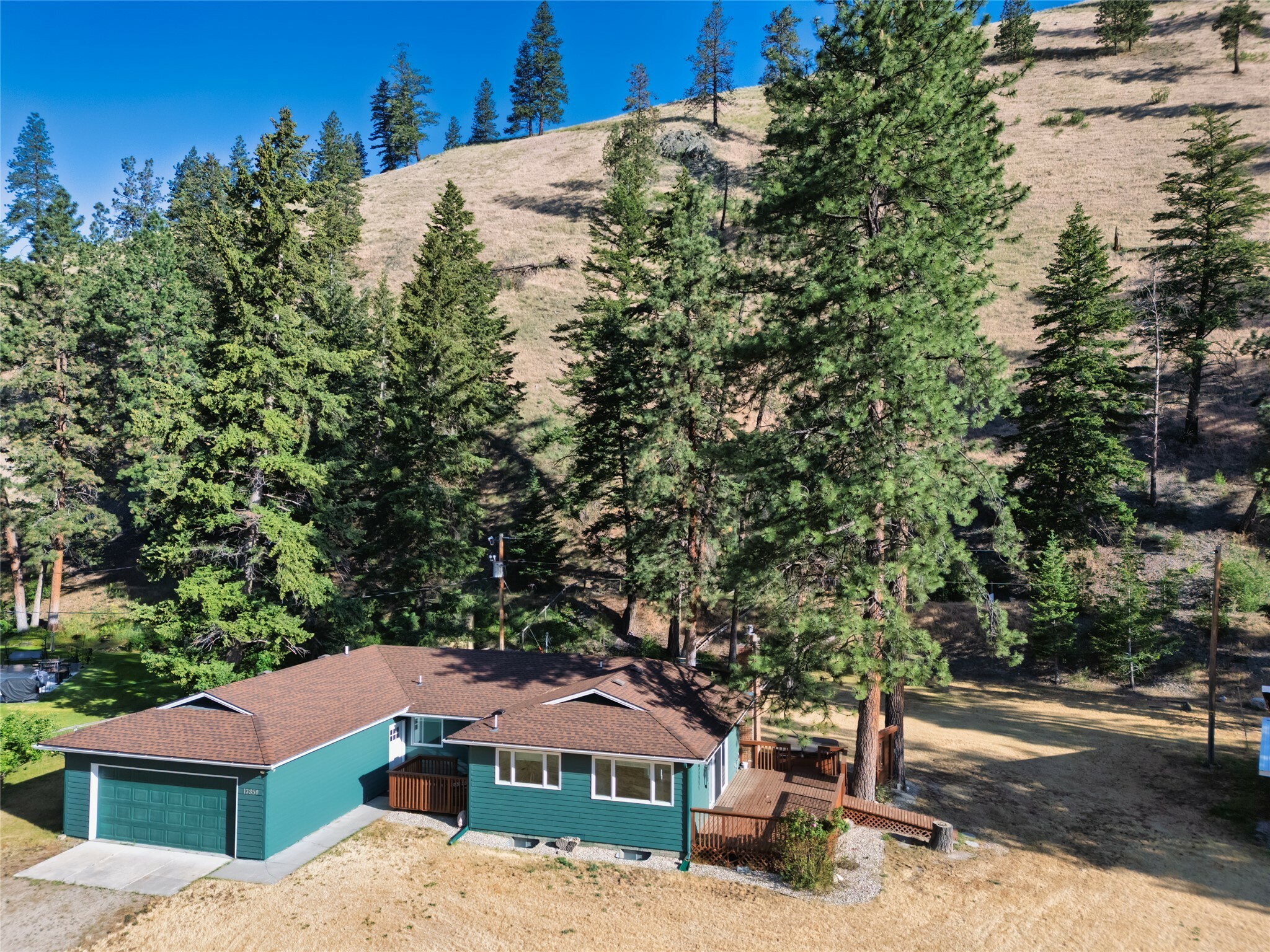 Property Photo:  13850 Highway 12 W  MT 59847 
