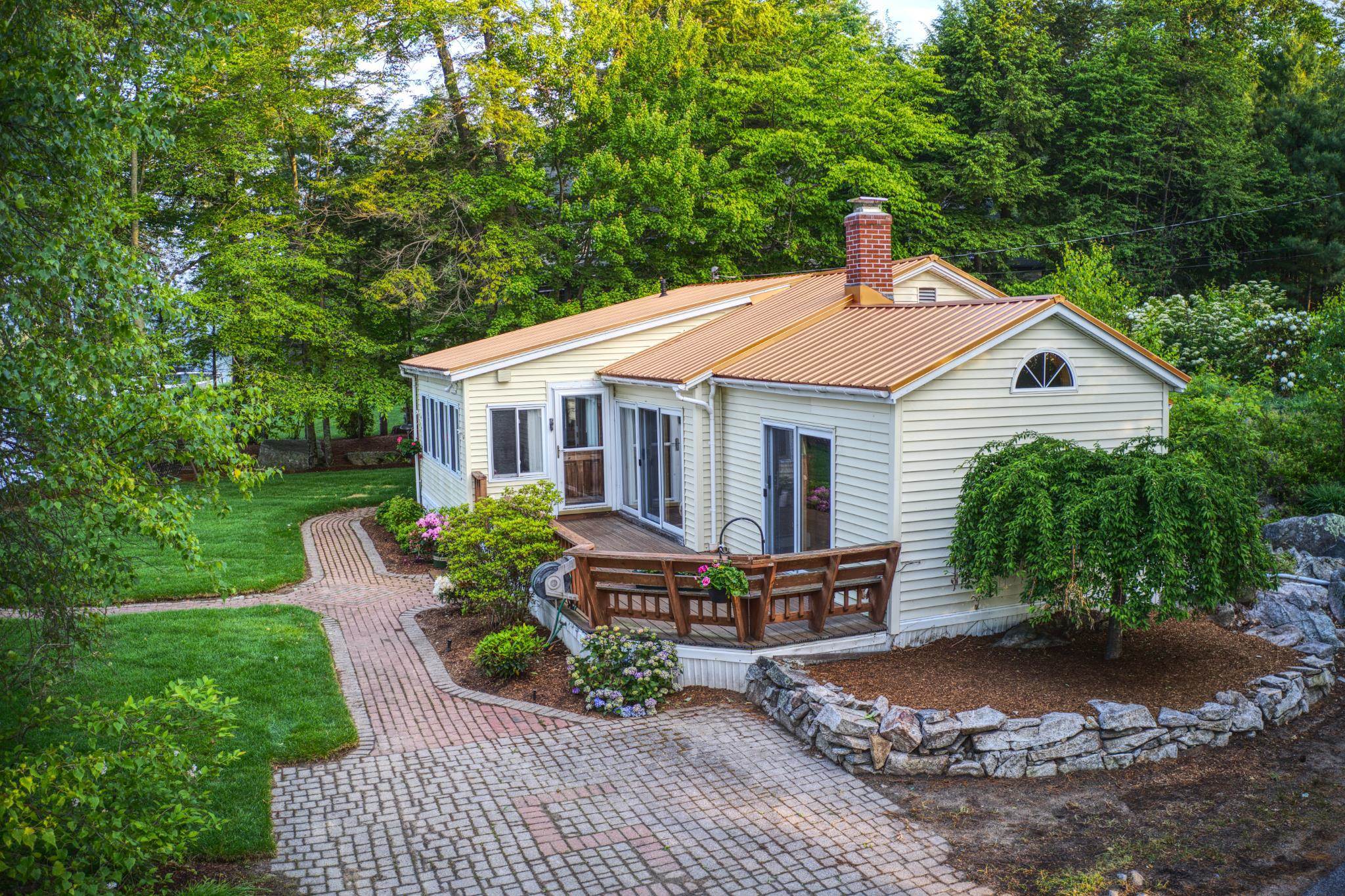 Property Photo: 18 Black Cat Island Road NH 03254