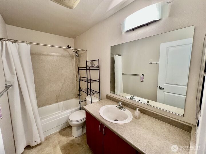 Property Photo:  15415  35th Avenue W E103  WA 98087 