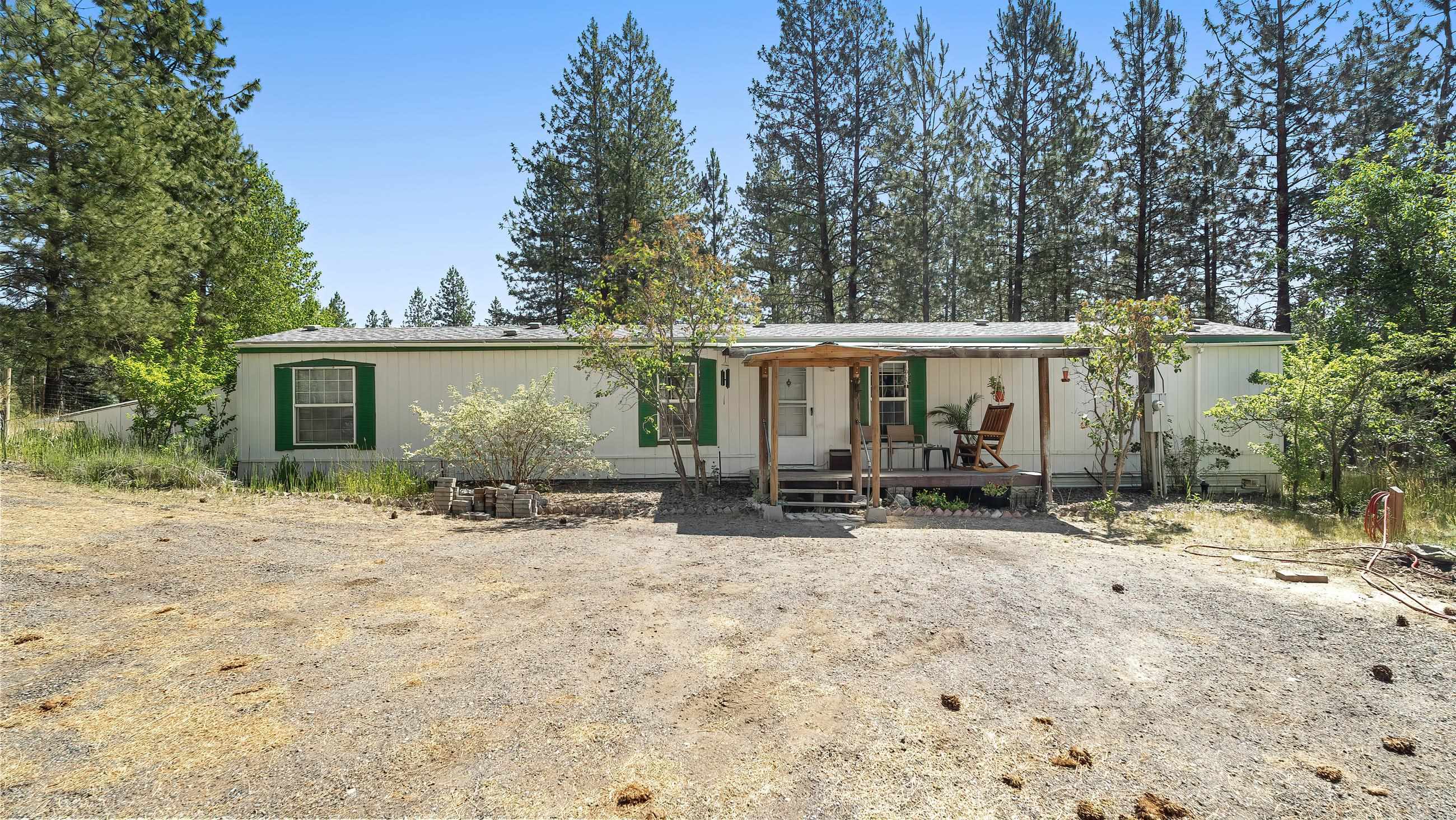 Property Photo: 6262 W Whitmore Hill Rd WA 99006