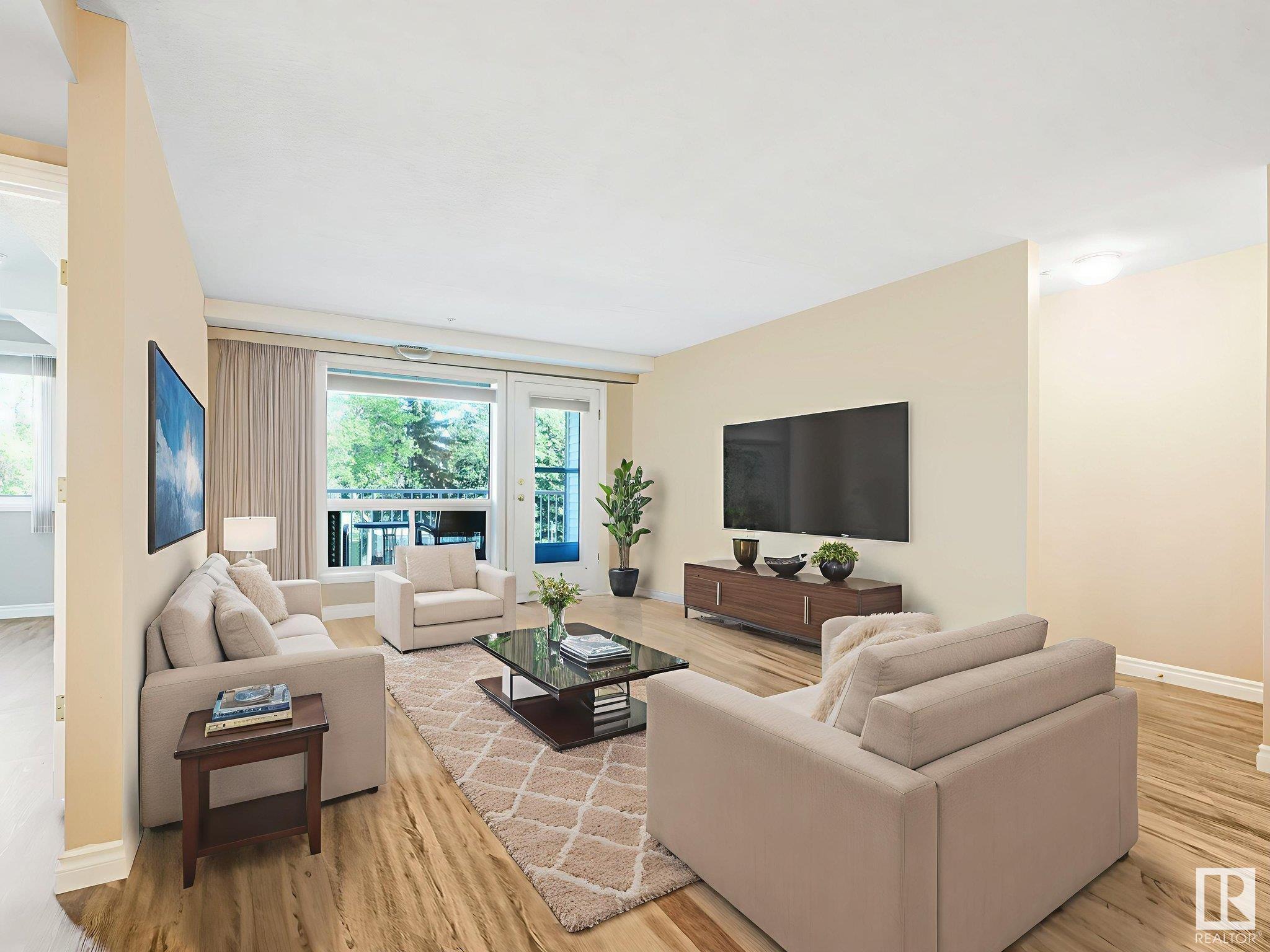 Property Photo:  6220 Fulton Road NW 211  AB T6A 3T4 