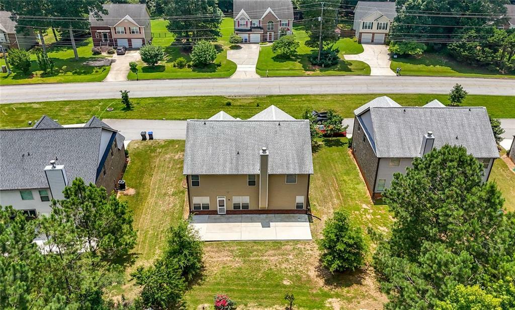 Property Photo:  2445 Whitehead Place Drive  GA 30024 