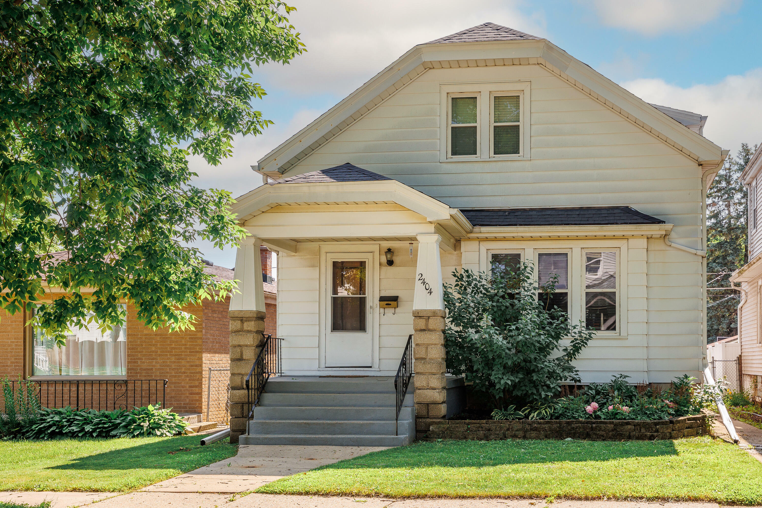 Property Photo:  2404 S 62nd St  WI 53219 