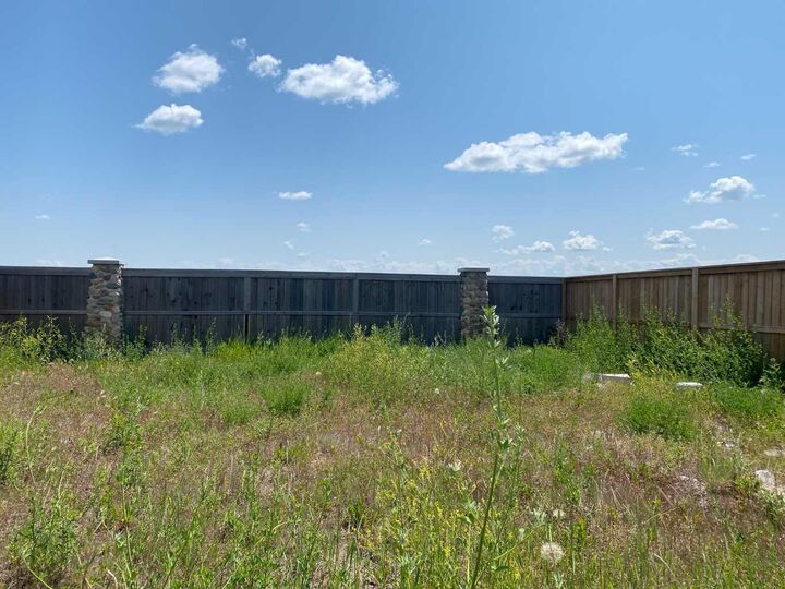 Property Photo: 321 Rivergrove Chase W AB T1K 8E8