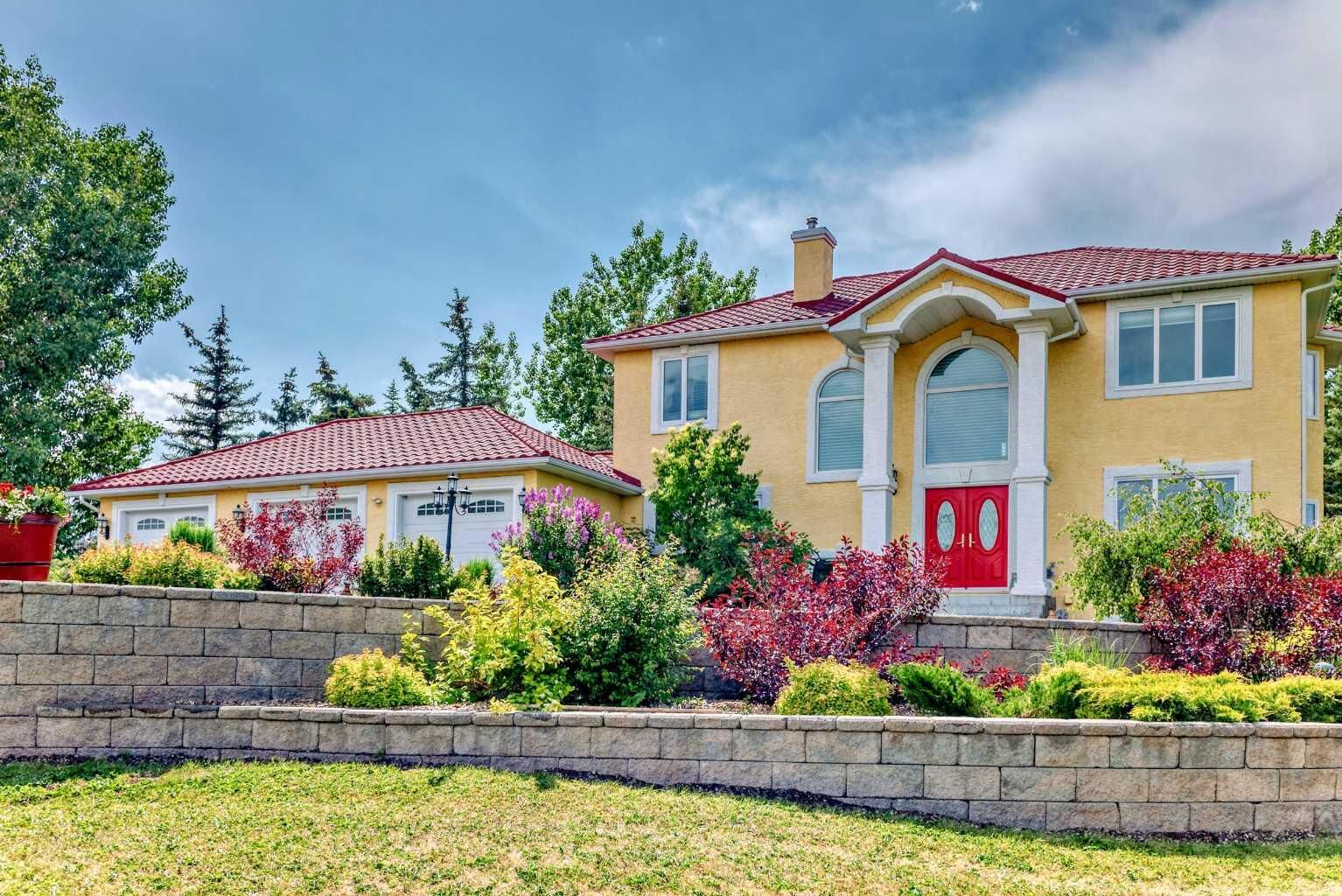 Property Photo:  226235 22 Street W  AB T1S 3N2