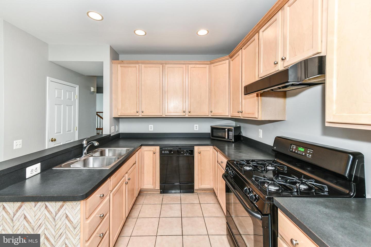 Property Photo: 5077 Village Fountain Place VA 20120