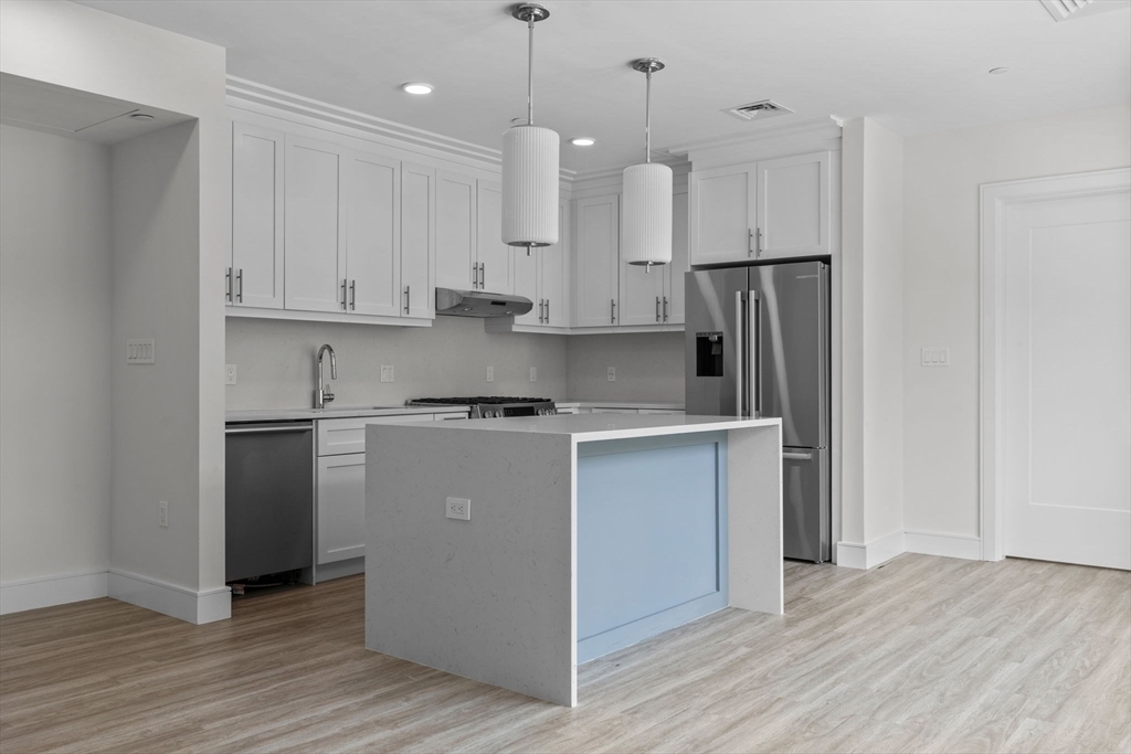 Property Photo:  301 Border Street 211  MA 02128 