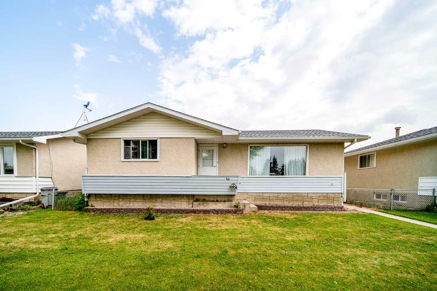 Property Photo: 718 7 Avenue AB T9W 1C1