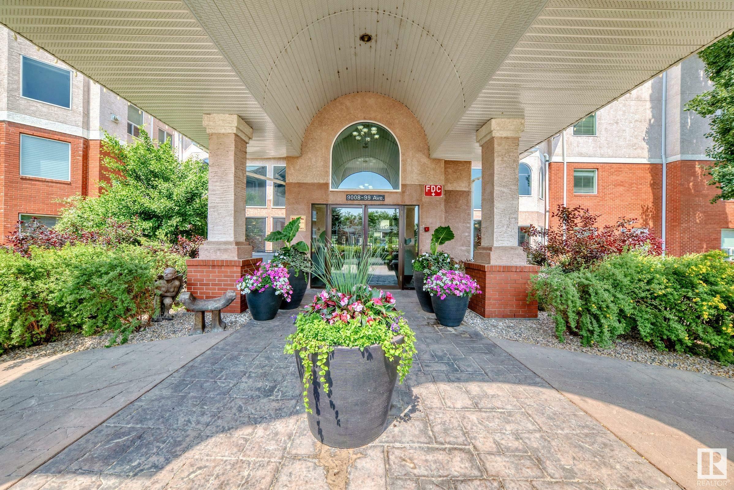 Property Photo: 9008 99 Avenue NW 102 AB T5H 4M6
