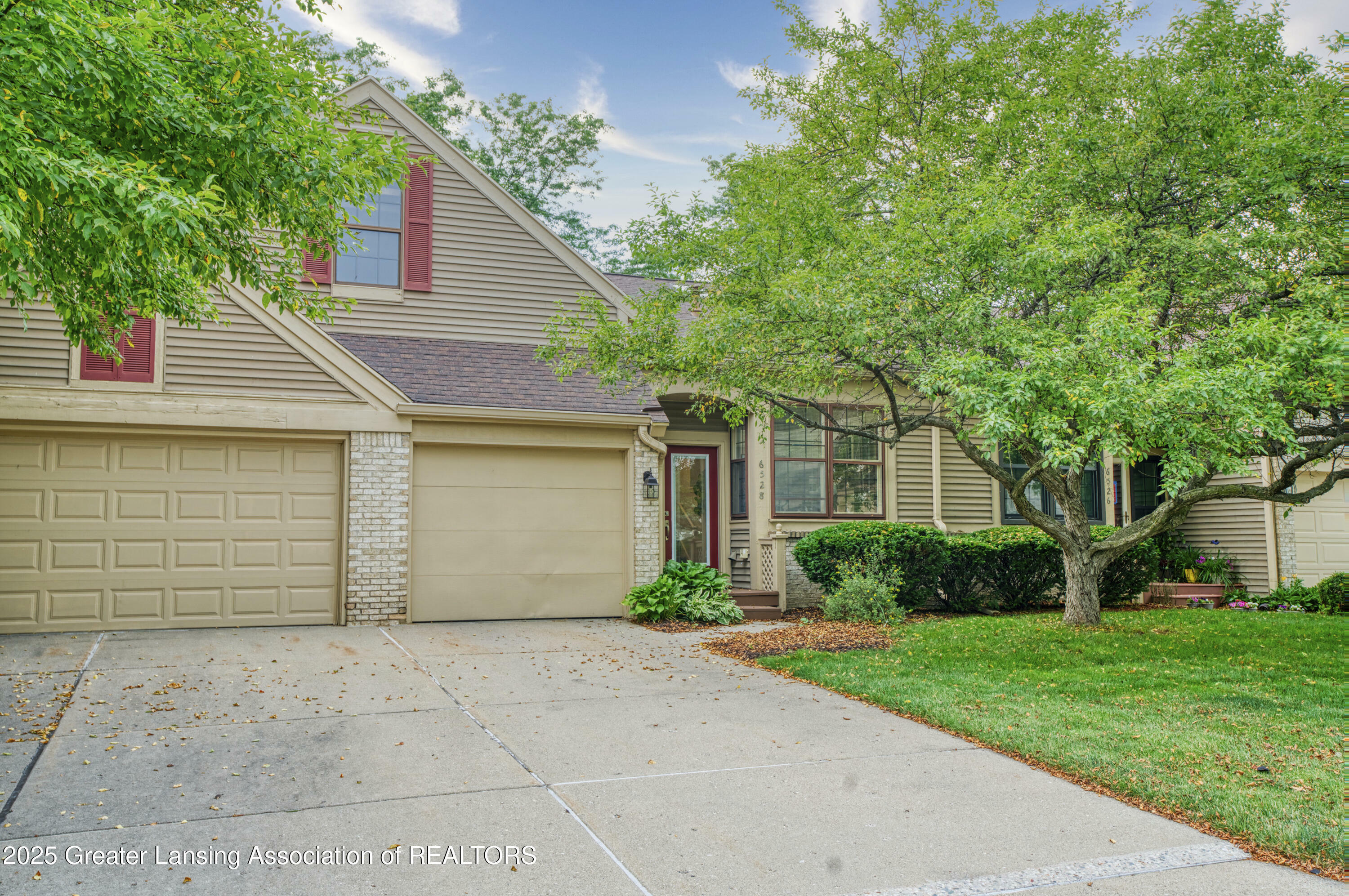Property Photo:  6528 Springtree Lane  MI 48917 