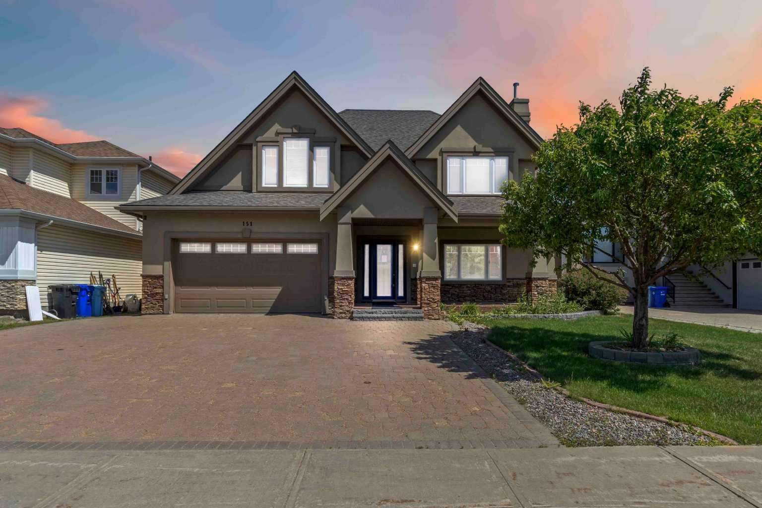 Property Photo: 151 Wild Rose Street AB T9K 0G7
