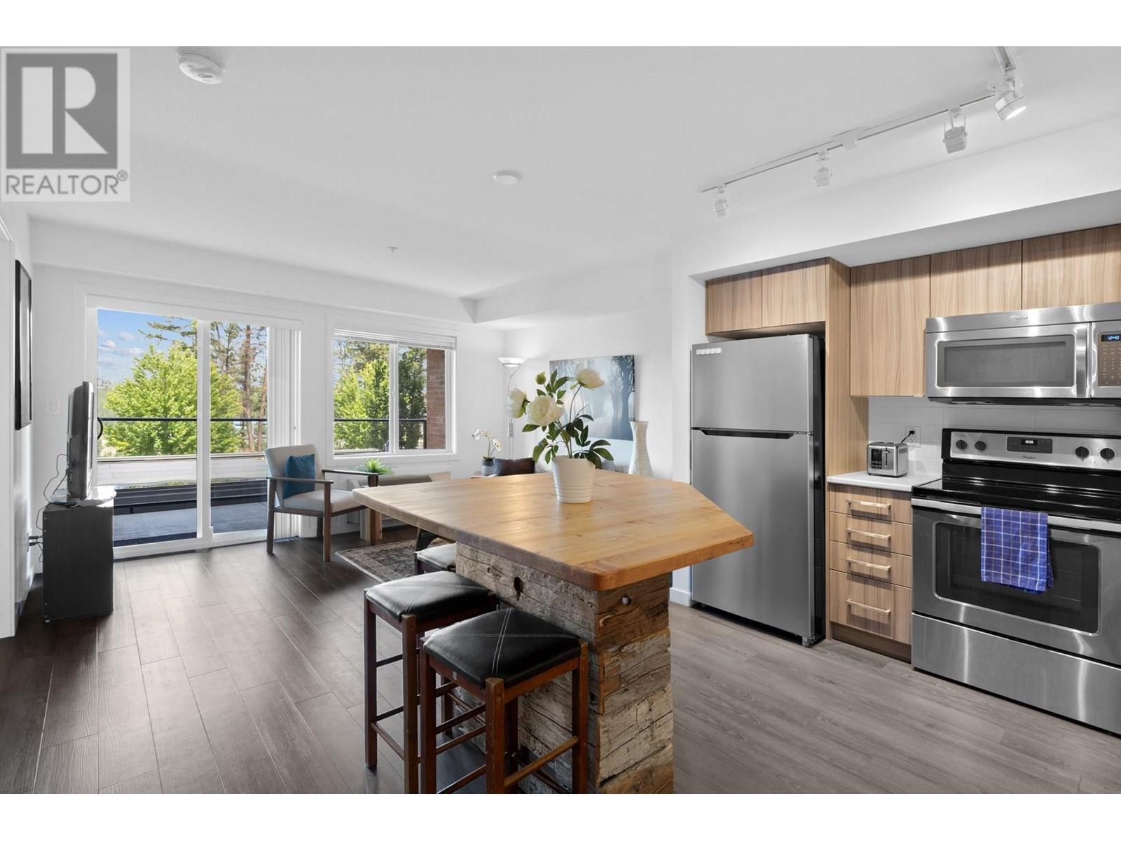 Property Photo: 881 Academy Way 103 BC V1V 0A2