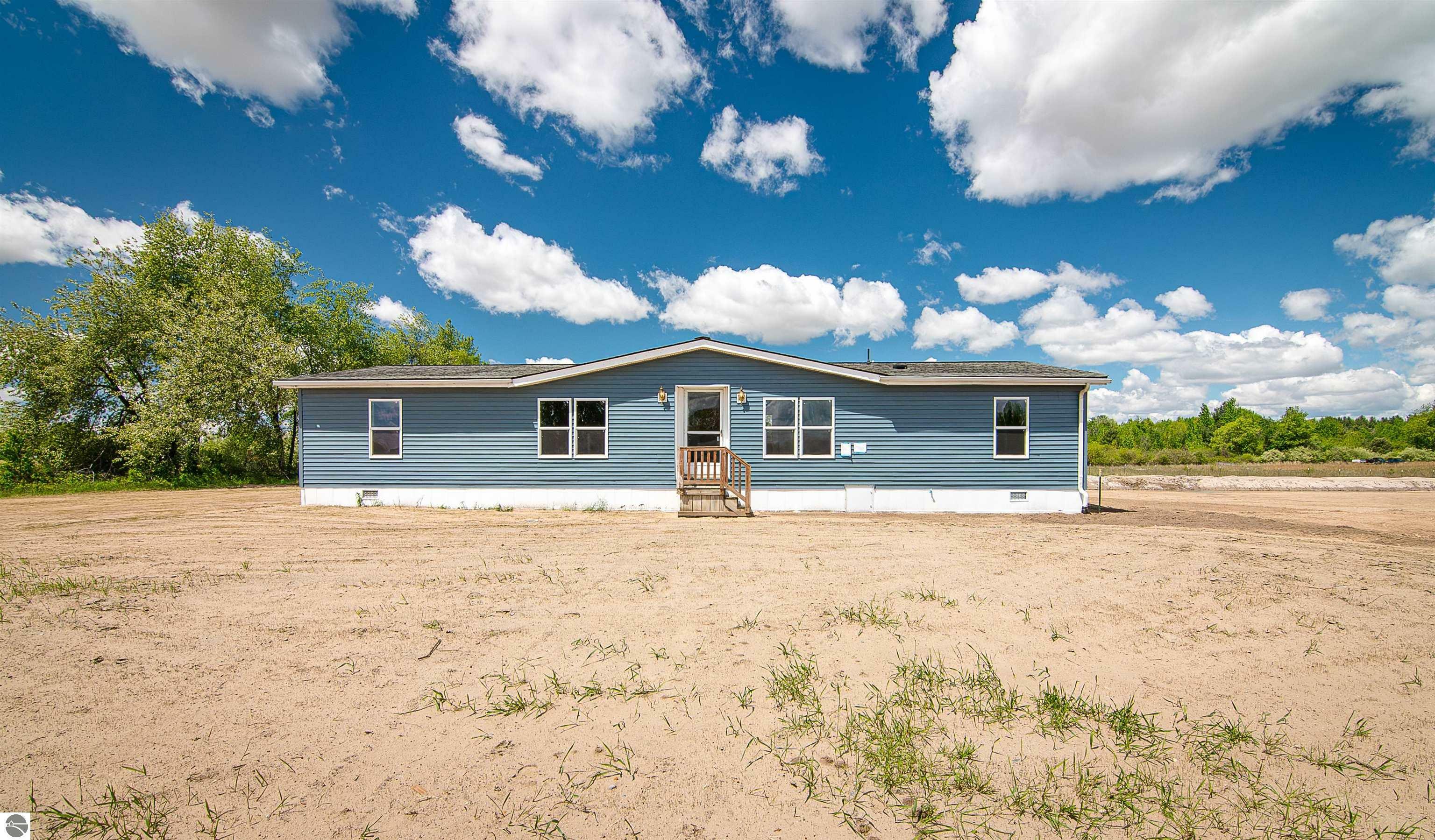 Property Photo: 5730 Cavender Drive MI 48883