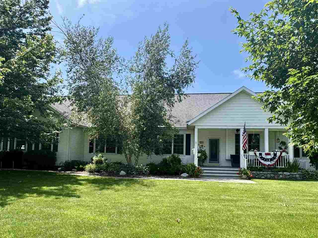 Property Photo:  7570 Bay Meadow  MI 49740