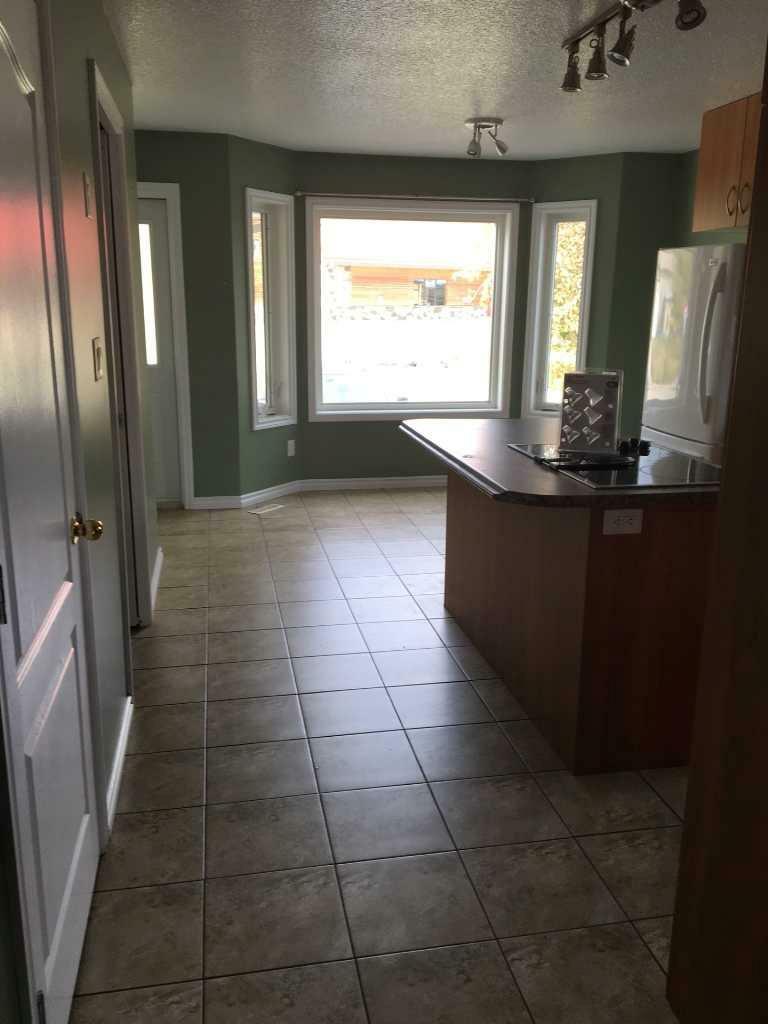 Property Photo: 10417 9 Street AB T8S 1N9