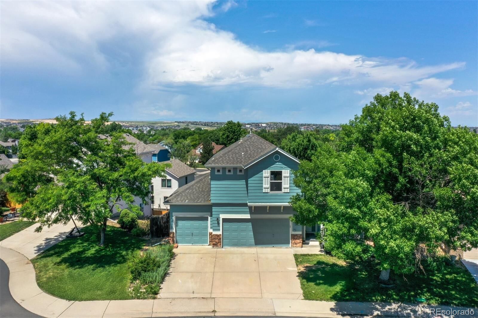Property Photo: 12535 S Beaver Creek Way CO 80134