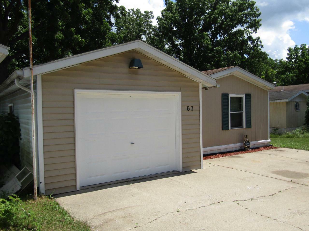 Property Photo: 67 Falling Creek Circle 67 WI 53548