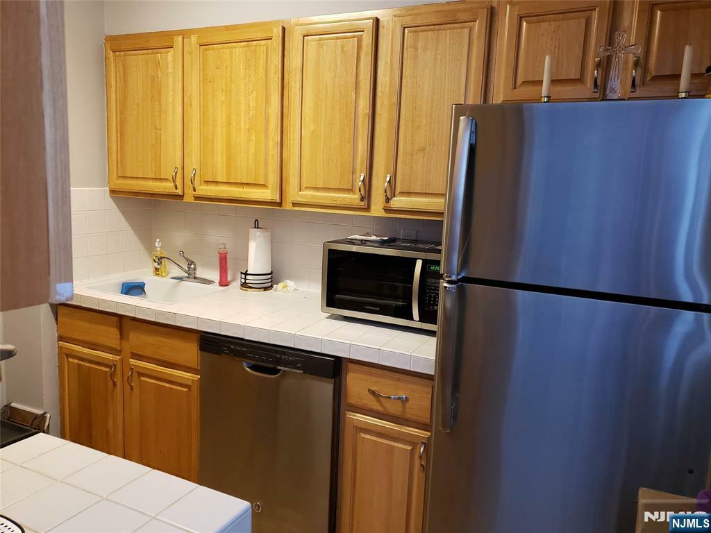 Property Photo:  6050 Kennedy Boulevard 12D  NJ 07093 