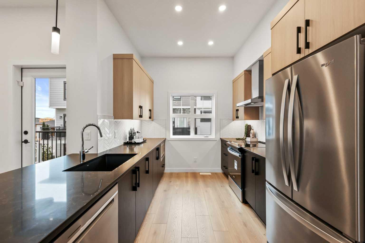 Property Photo: 595 Mahogany Road SE 111 AB T3M 3Y3