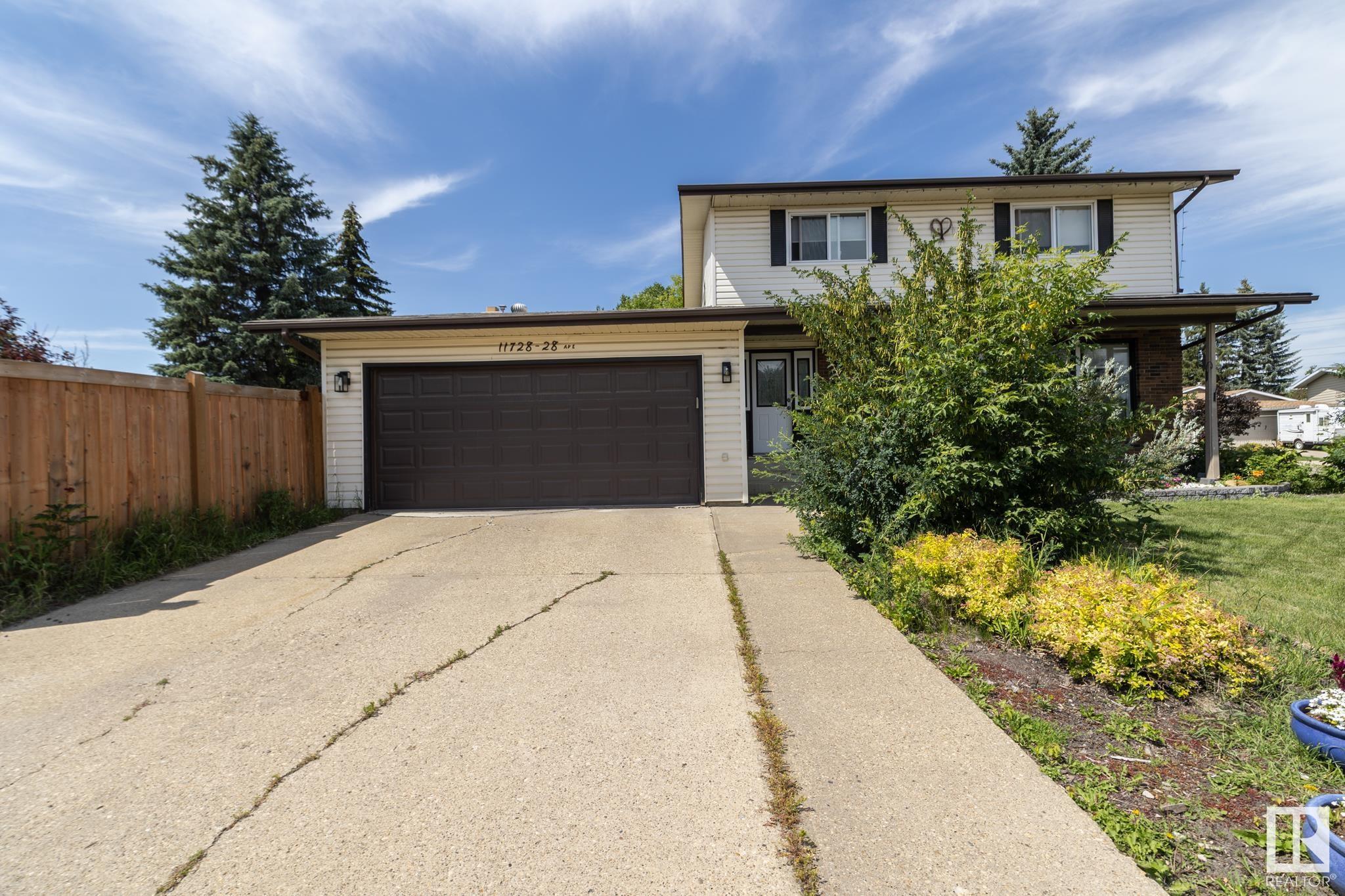Property Photo: 11728 28 Avenue NW AB T6J 3P2